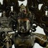 Oxidized Copper 14" Yellow Dzambhala Statue with Lion (Kubera) - Face Detail