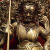 Antique Copper Finish 35cm Yellow Dzambhala Statue (Snow Lion Mount) - Face Detail