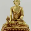 Front view of a Medicine Buddha statue handmade in Nepal from copper alloy, fire gilded in low-luster 24K gold with a hand-painted face, myrobalan plant, medicine bowl, engraved monastic robe, and double lotus throne.