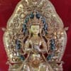 23-inch Maitreya Buddha Statue seated in Bhadrasana "Auspicious" posture with ornate 24K gold gilded throne, Parasol above Frame, Dharmachakra mudra and elaborate Newari sacred frame