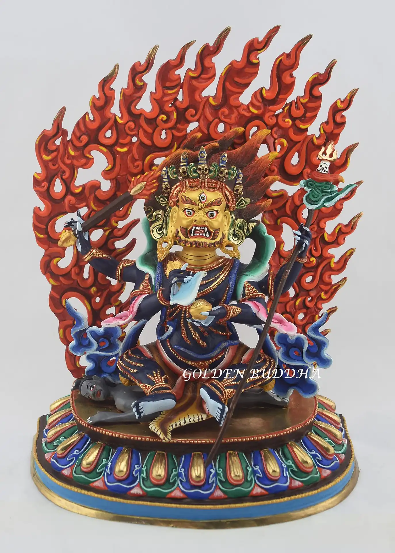 13.5-inch Multicolored Chaturbhuja Mahakala with four arms, blue-black body, gold-painted face, skull crown and flaming aureole